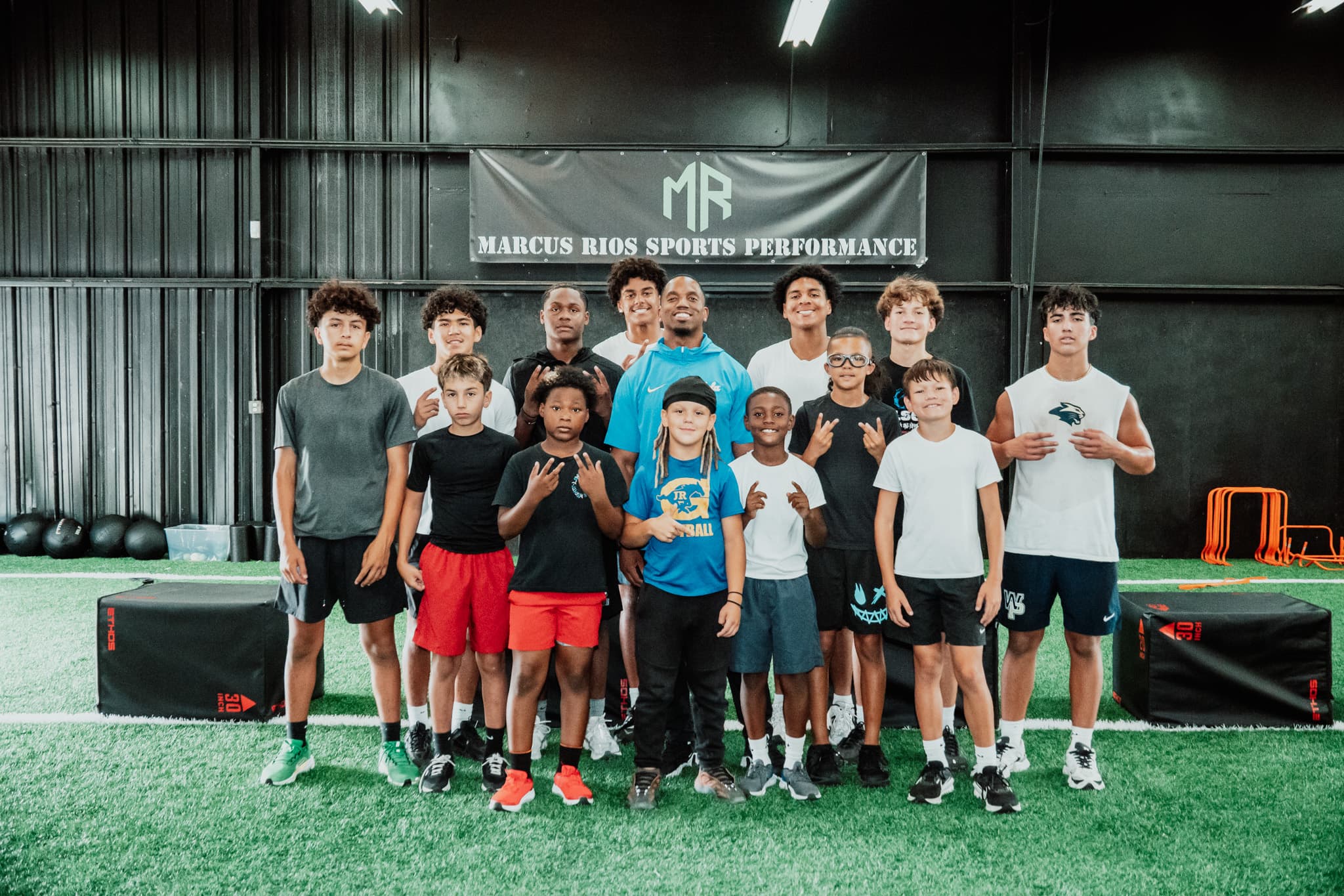 Marcus Rios Athlete Academy team at the training facility